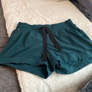 Lulu green shorts.  Size 4
